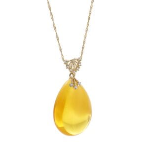 Unikatowa złota zawieszka bursztynowa w kształcie sopla z cyrkoniami